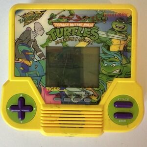 Tiger Teenage Mutant Ninja Turtles Dimension X Assault Electronic Handheld‎ Read